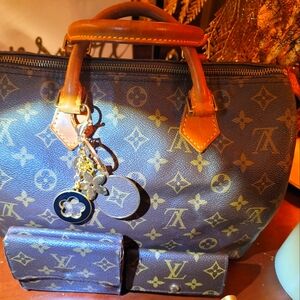 Authentic Louis Vuitton speedy 30, wallet, key holder, and charm.
